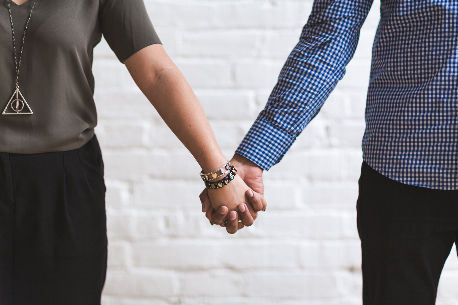 Two People holding hands 