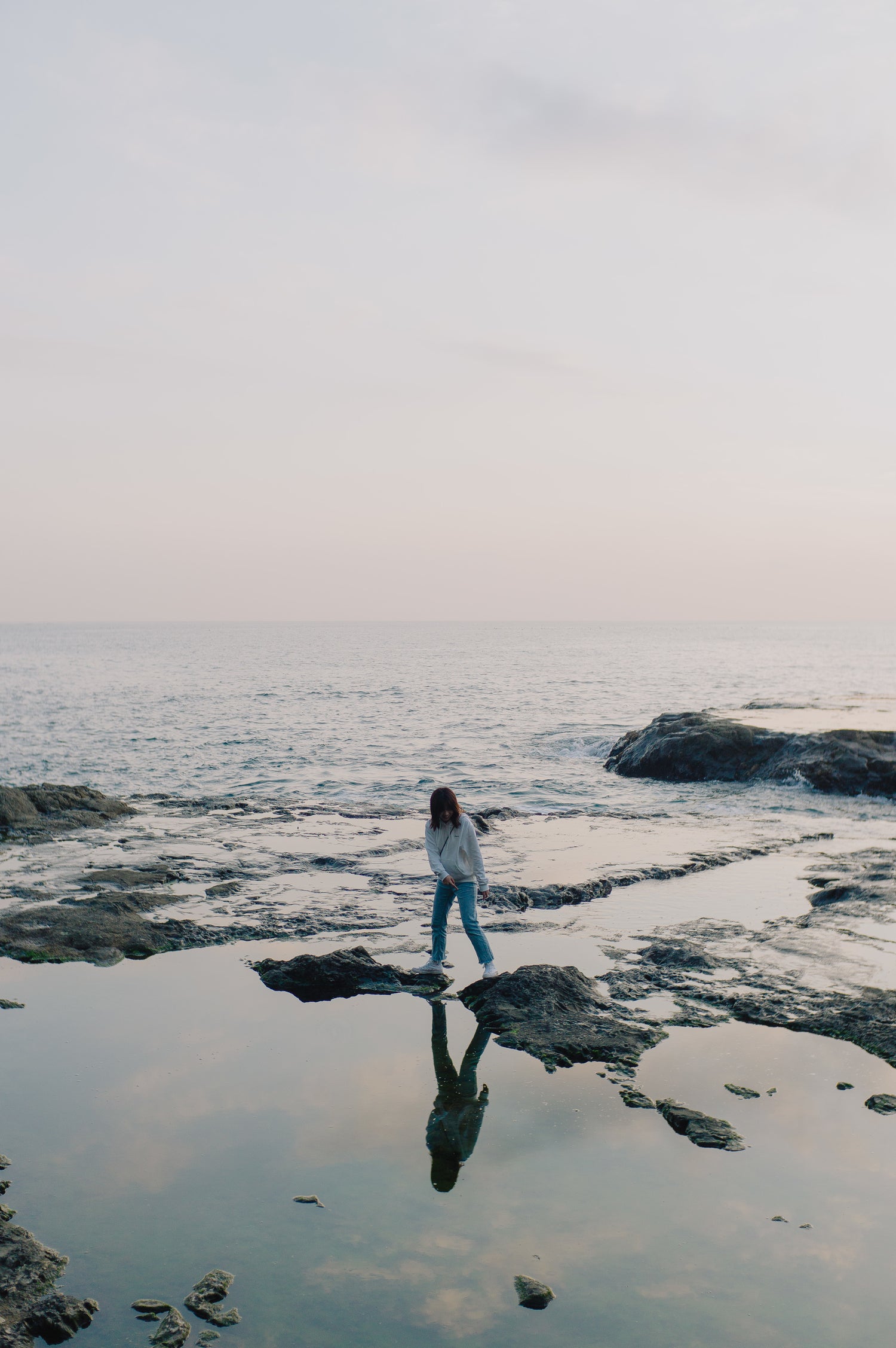 Teen walking on the beach